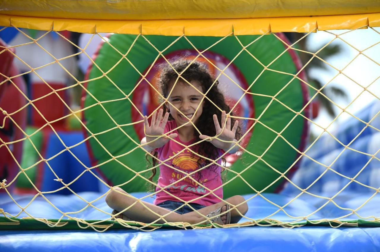 Sealine Beach, A Murwab Resort Месаид Экстерьер фото A child playing at the Children's Museum of Oak Ridge