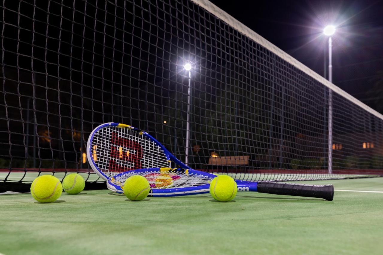 Sealine Beach, A Murwab Resort Месаид Экстерьер фото Tennis balls and racket